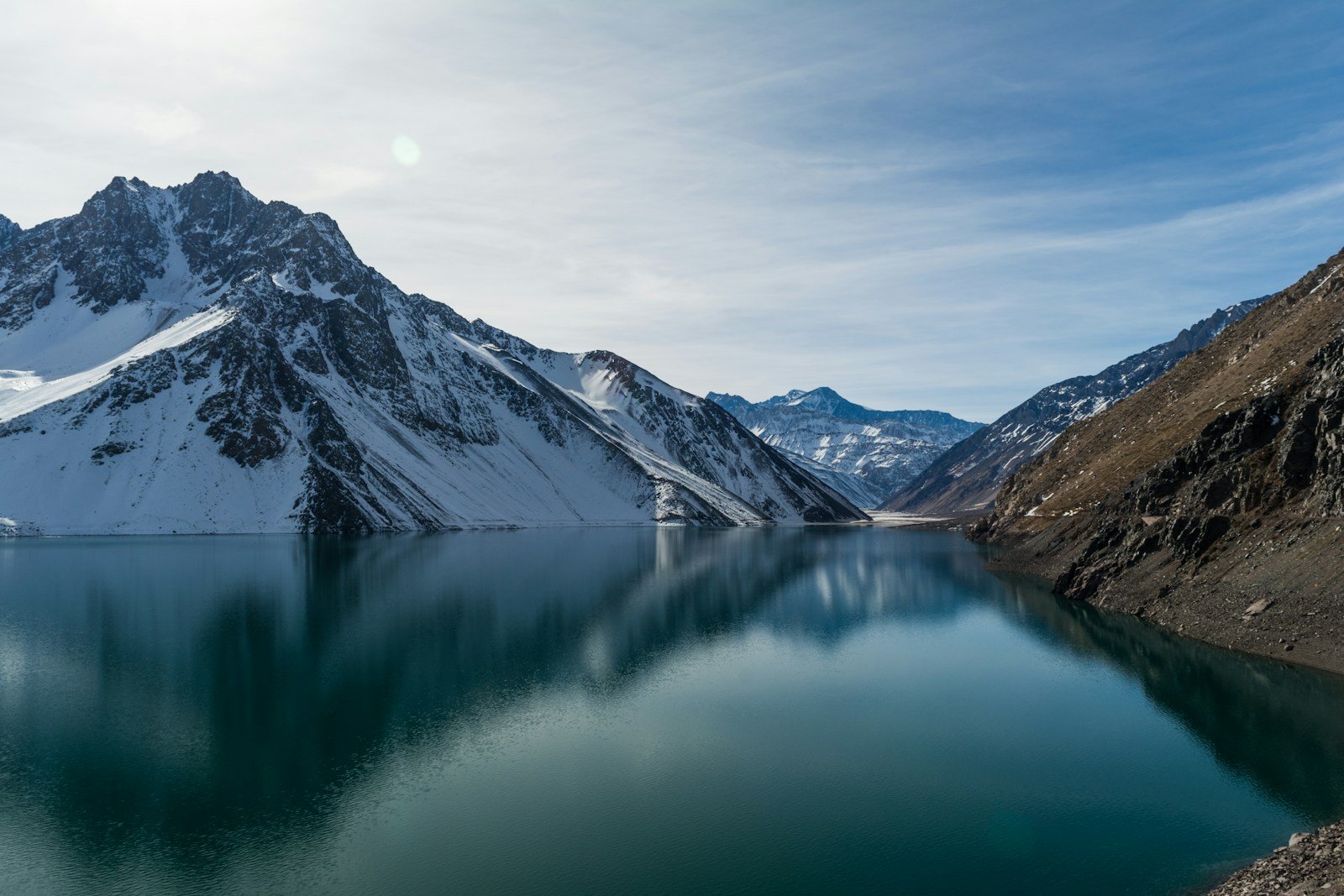 agua de los Andes, snow-covered mountain near body of water